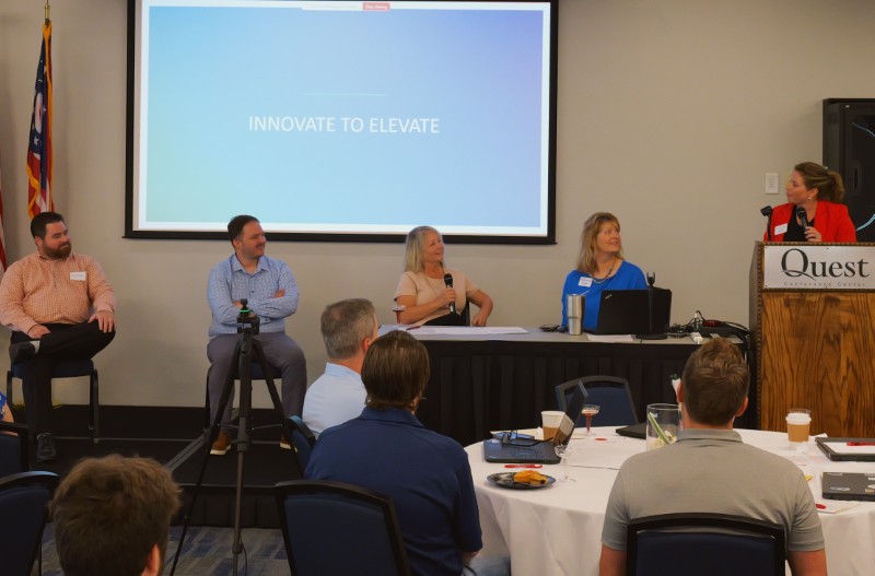 Christine Mayes leads panel discussion